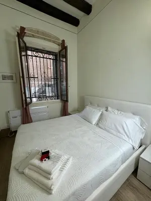 Letto o letti in una camera di Appartamento Matilde's Lagoon Side