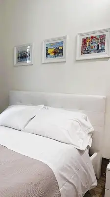Letto o letti in una camera di Appartamento Matilde's Lagoon Side