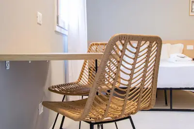 Letto o letti in una camera di Welc-ōM Tommaseo Green Building Business Free Parking