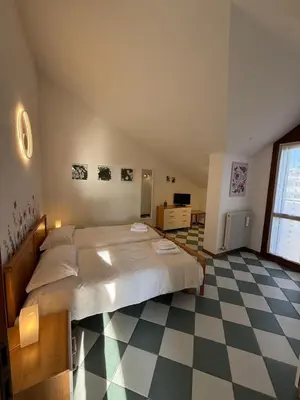 Letto o letti in una camera di Casa di Marzia