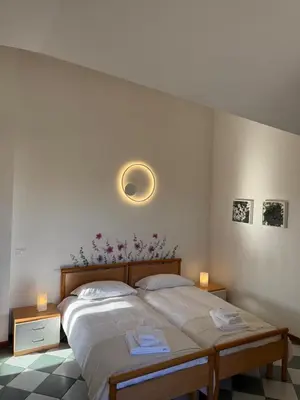 Letto o letti in una camera di Casa di Marzia