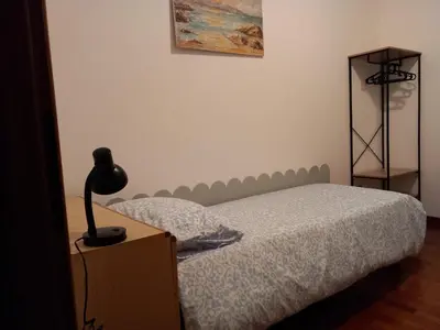 Letto o letti in una camera di Selene Apartment 20 minutes by train from Venice