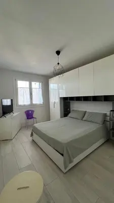 Letto o letti in una camera di La Casa di Nives