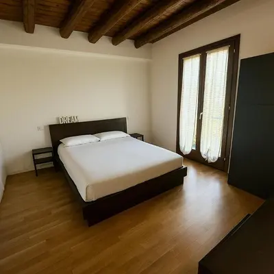 Letto o letti in una camera di Residenza Tiglio - Pool & Relax