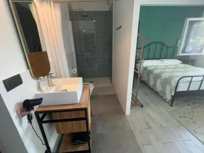 Letto o letti in una camera di 威尼斯民宿Venezia Stay 东北阿姨的小屋