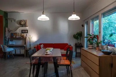 Area soggiorno di 威尼斯民宿Venezia Stay 东北阿姨的小屋