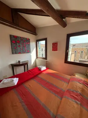 Letto o letti in una camera di Incantevole Loft a Venezia