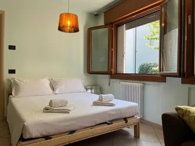 Letto o letti in una camera di Padova Green Stay