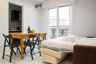 Letto o letti in una camera di Welc-ōM La casa di nonna Tina