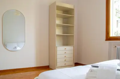 Letto o letti in una camera di Welc-ōM Crescini Padova