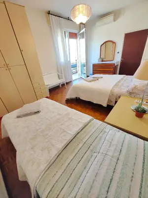 Letto o letti in una camera di Venezia Stella