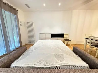 Letto o letti in una camera di Moderno appartamento in centro a Treviso - sotto i portici