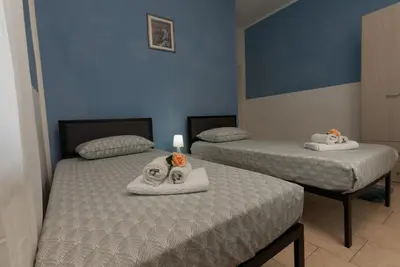 Letto o letti in una camera di GajoSanti apartments