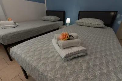 Letto o letti in una camera di GajoSanti apartments