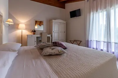 Letto o letti in una camera di Agriturismo Casa Rossa