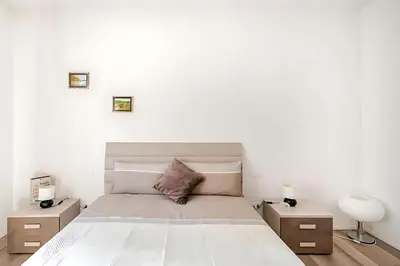 Letto o letti in una camera di Dimora Laguna - Cozy apartment in Mestre Venezia
