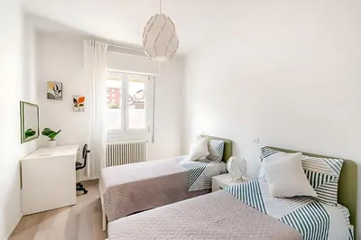 Letto o letti in una camera di Dimora Laguna - Cozy apartment in Mestre Venezia