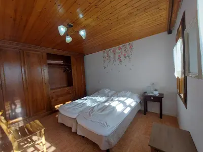 Letto o letti in una camera di The garden holiday apartment