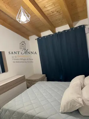 Letto o letti in una camera di Residence Sant'Anna