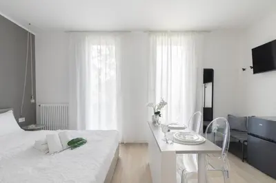 Letto o letti in una camera di Cima Suite 14 by WelcHome