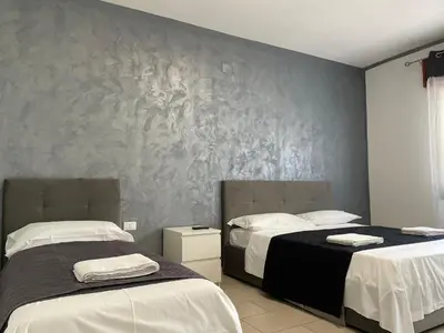 Letto o letti in una camera di Venetian Breeze
