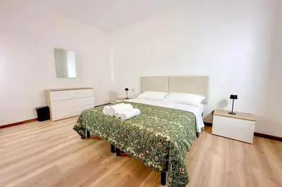 Letto o letti in una camera di Residence Foscolo