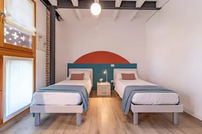 Letto o letti in una camera di La Montagnola