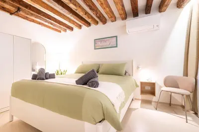 Letto o letti in una camera di San Marco, corte privata, nuovo, adatto per coppia
