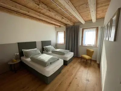 Letto o letti in una camera di Agriturismo I Giardini di Ron