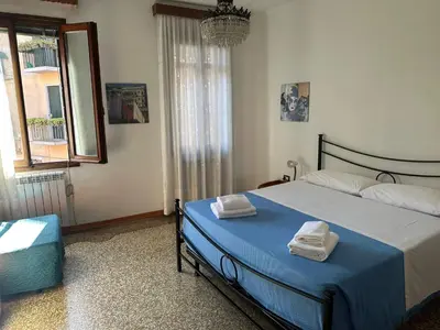 Letto o letti in una camera di Casa Canali