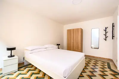 Letto o letti in una camera di Palazzina Pistor 1st Floor by Sarlux