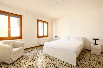 Letto o letti in una camera di Palazzina Pistor 2nd Floor by Sarlux