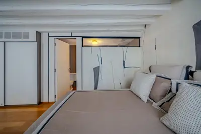 Letto o letti in una camera di Casa Luce