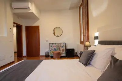 Letto o letti in una camera di Casa Bauta