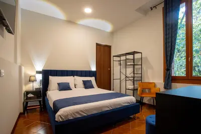 Letto o letti in una camera di Casa Bauta