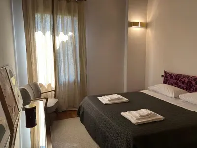 Letto o letti in una camera di Villa Moro Lin Design Apartments