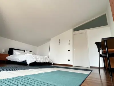 Letto o letti in una camera di Spacious 3 BDR Apartment in Padua