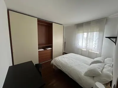 Letto o letti in una camera di Spacious 3 BDR Apartment in Padua