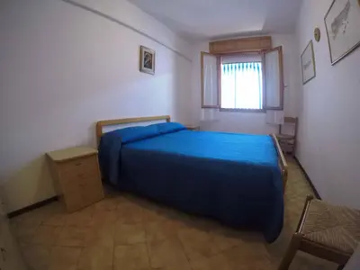 Letto o letti in una camera di Apartment in Rosolina Mare 34041