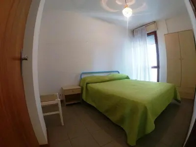 Letto o letti in una camera di Apartment in Rosolina Mare 34042