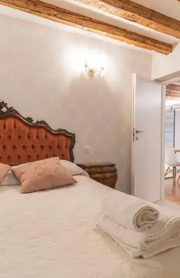 Letto o letti in una camera di Ca' Sartori Venezia