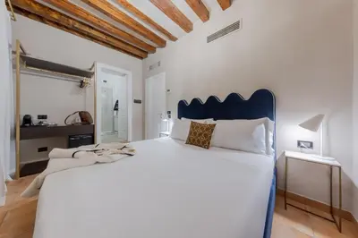 Letto o letti in una camera di Daplace - Antica Casa Coppo