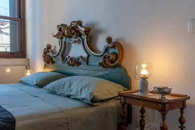 Letto o letti in una camera di Stylish Apt w Panoramic Terraces Heart of Venice