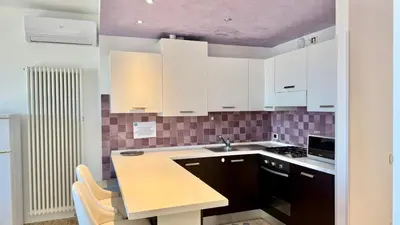 Cucina o angolo cottura di Le Murrine Frontemare Apartment Seaview 504