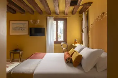 Letto o letti in una camera di Hotel Riva