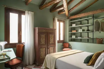 Letto o letti in una camera di Hotel Riva