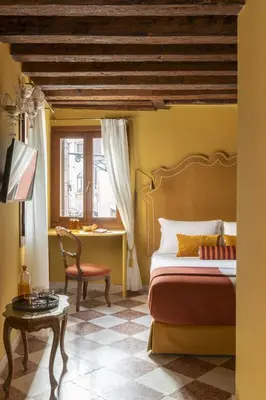 Letto o letti in una camera di Hotel Riva