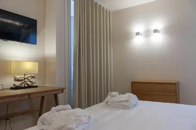 Letto o letti in una camera di MBL APARTMENTS