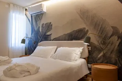 Letto o letti in una camera di MBL APARTMENTS