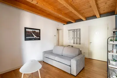 Area soggiorno di GuestHost - Piazza Mazzini Bright Apartment Padova